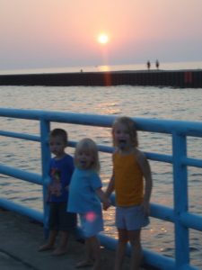 kids on boardwalk