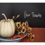Thanksgiving place setting with caption give thanks