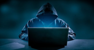 hacker at laptop